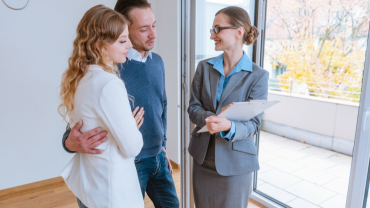 HOA Agent Discussing With Clients